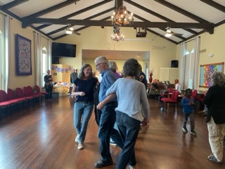 country dancers swing their partners