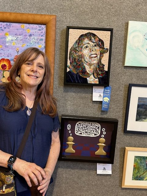 Lin Jovanovic poses with her blue-ribbon-winning mosaic at Nevada County Fair